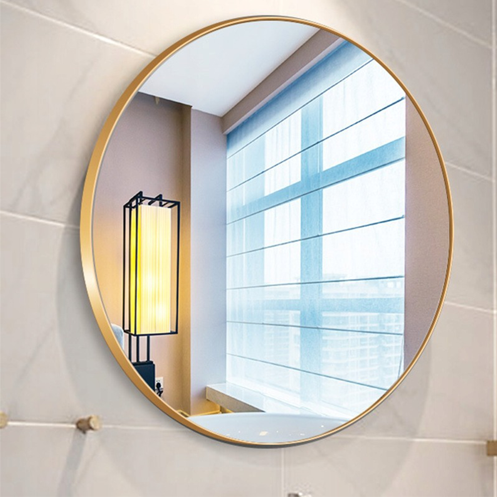 Okrągłe lustro ze złotą ramą 60 cm – elegancki design do łazienki i sypialni