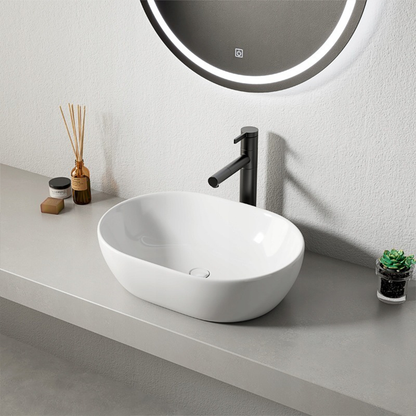 Nowoczesna umywalka owalna 49x35 cm – biała błyszcząca, ceramiczna